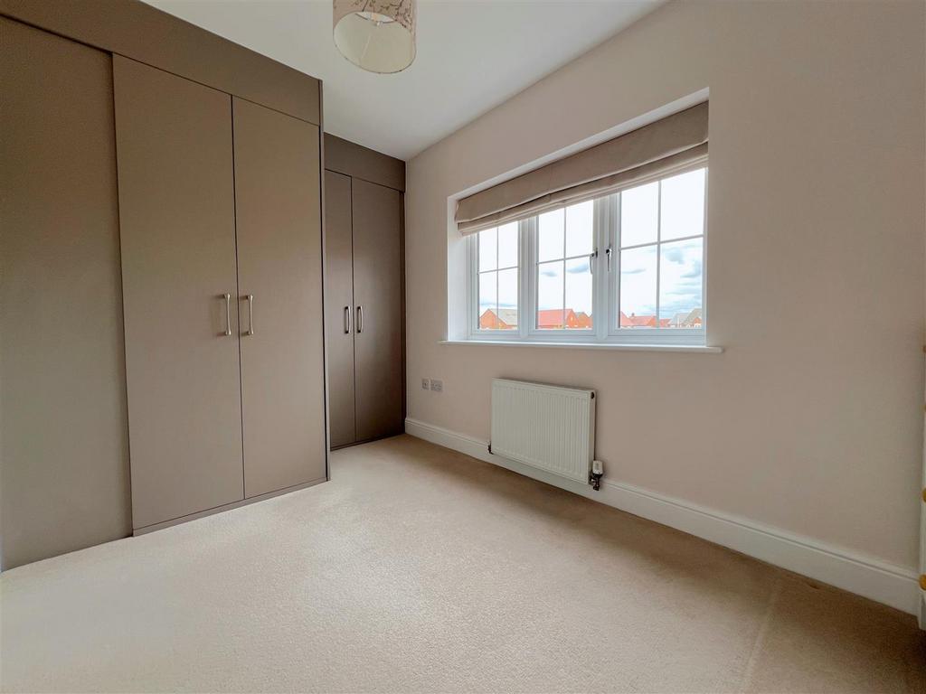 Bed 2 wardrobes.jpg