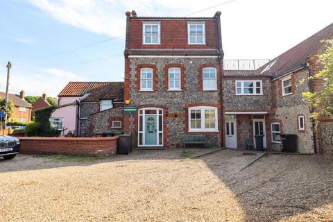 undefined, A Handsome, Period Residence Standing Proud in an Elevated Position on a Picturesque and Historic Common in West Runton