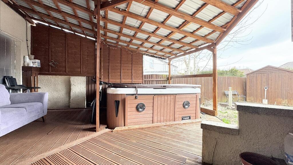 Enjoy a serene outdoor retreat with a spacious ...
