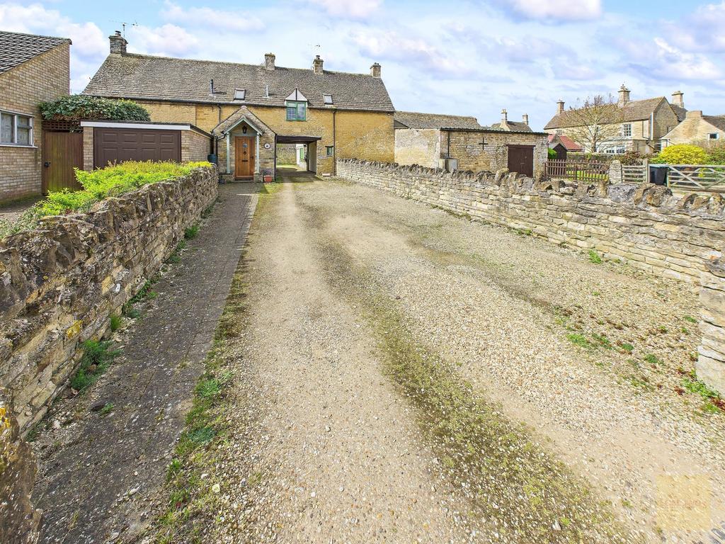 Driveway and Parking 2 x spaces to the right.