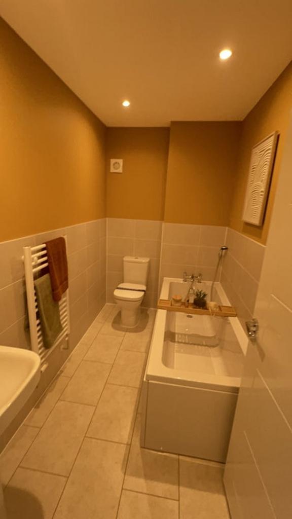 A beautifully designed bathroom suite featuring...
