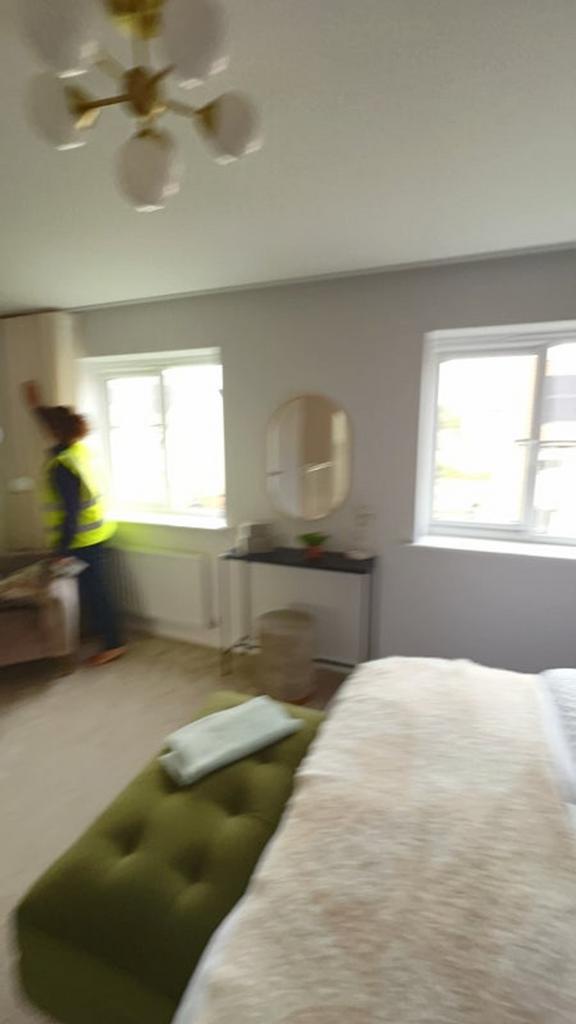 A beautifully arranged double bedroom featuring...