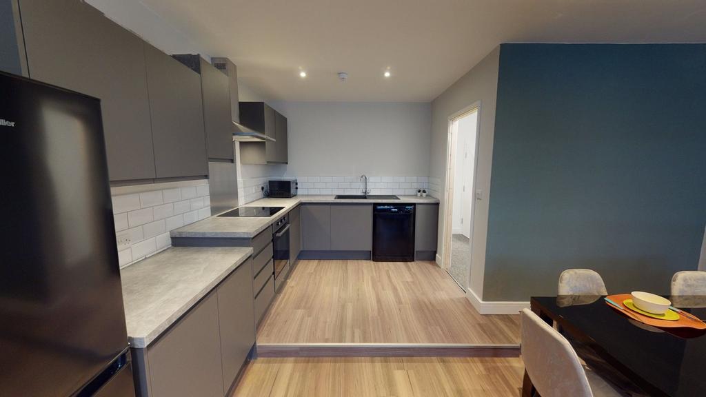 A modern and clean kitchenette featuring stylis...