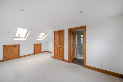 11 Cecil Road, London, SW19 1JR
