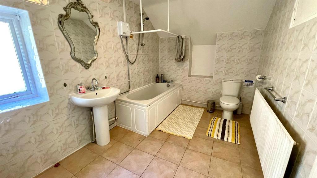 Fully tiled bathroom