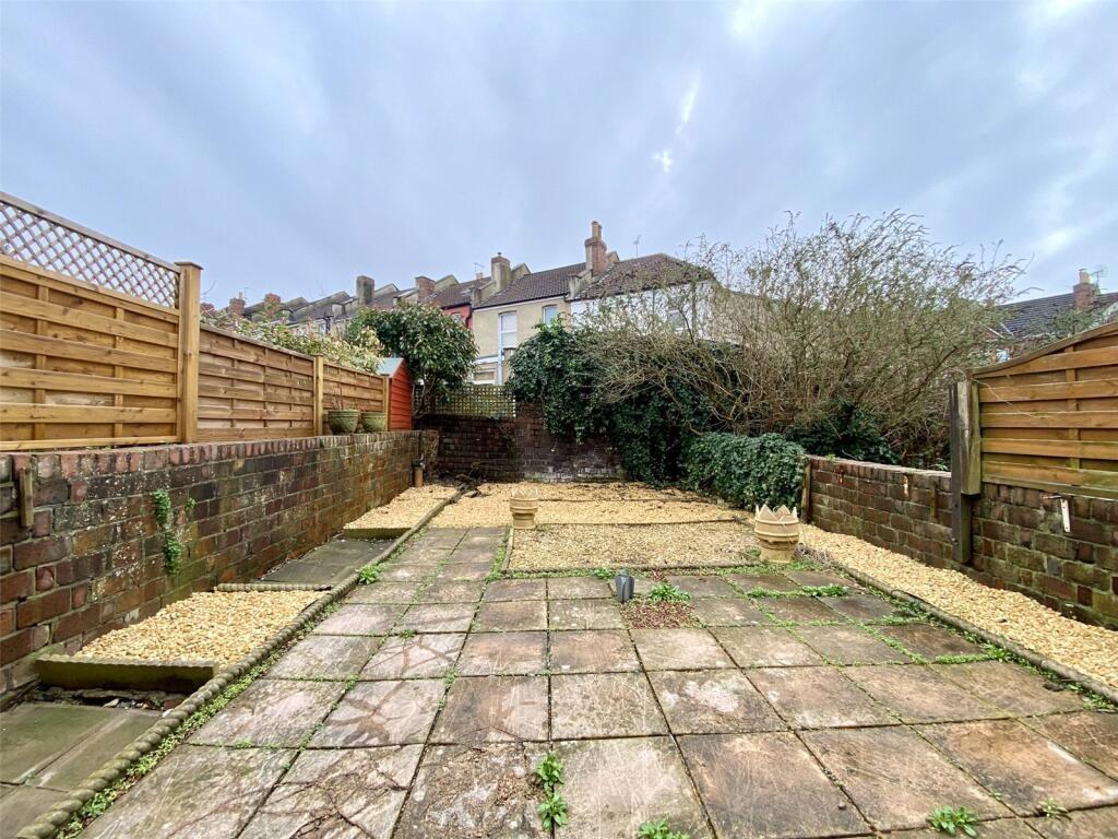 A charming garden space featuring a well-mainta...