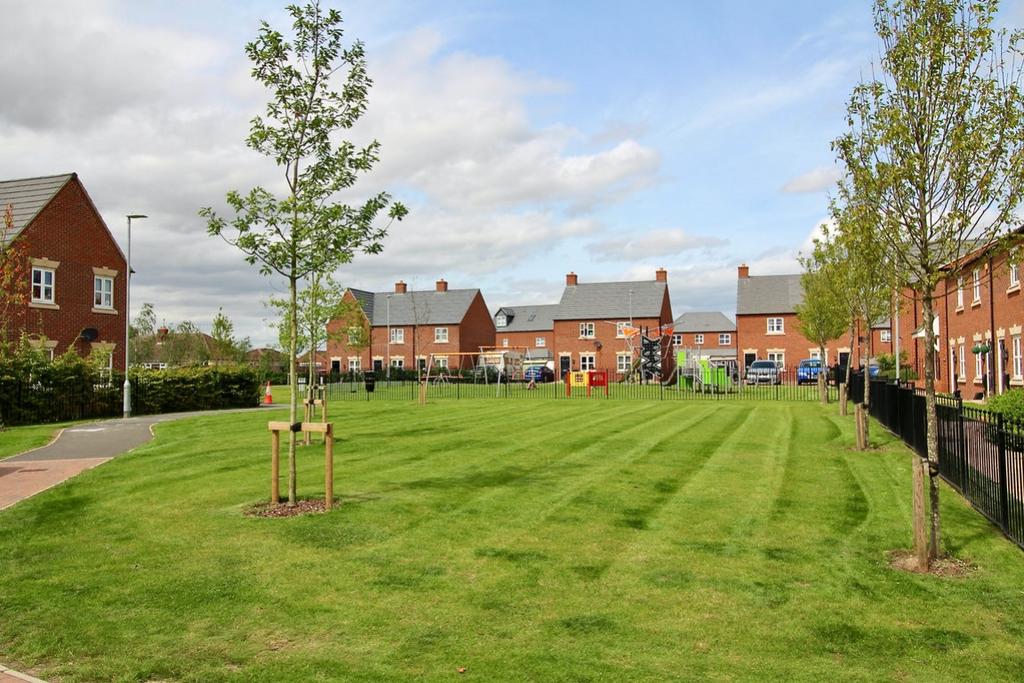Adjacent Green Space with Childrens Playground