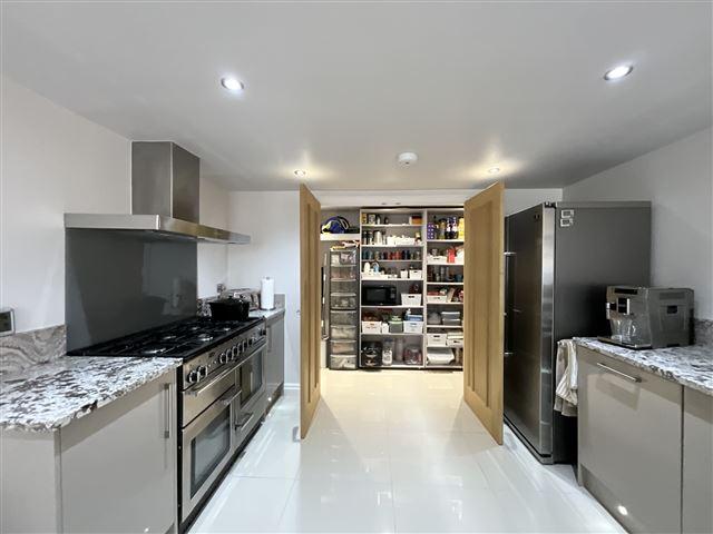 Kitchen/diner with walk-in lader cupboard