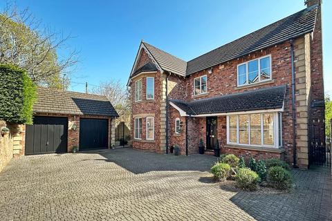 2 The Paddock, Timperley, Altrincham, WA15 7NR
