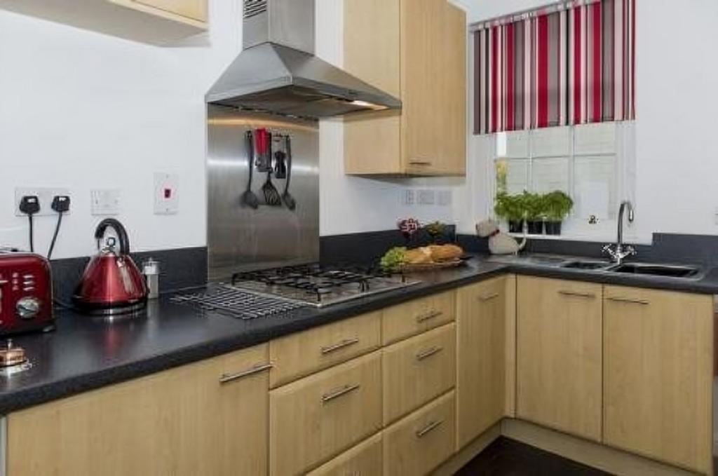 A bright and modern kitchenette featuring sleek...