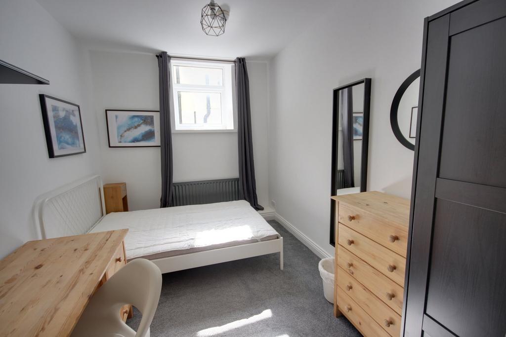 A bright and inviting double bedroom, perfect f...