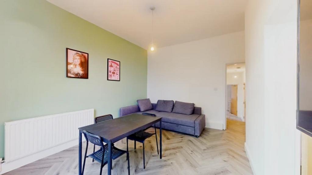 A spacious and inviting modern living room with...