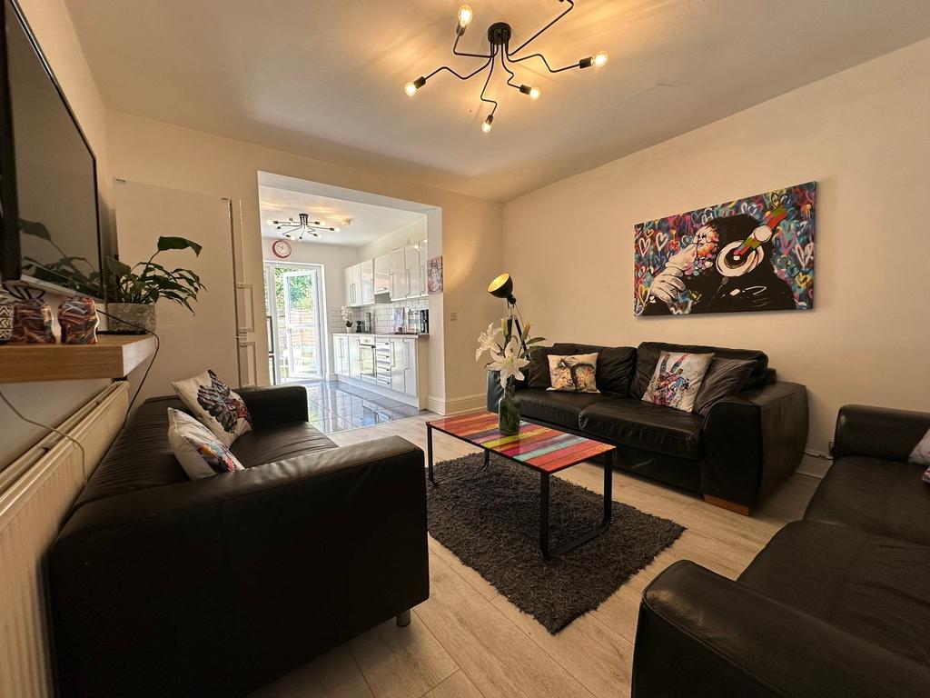 This stylish living room features contemporary ...