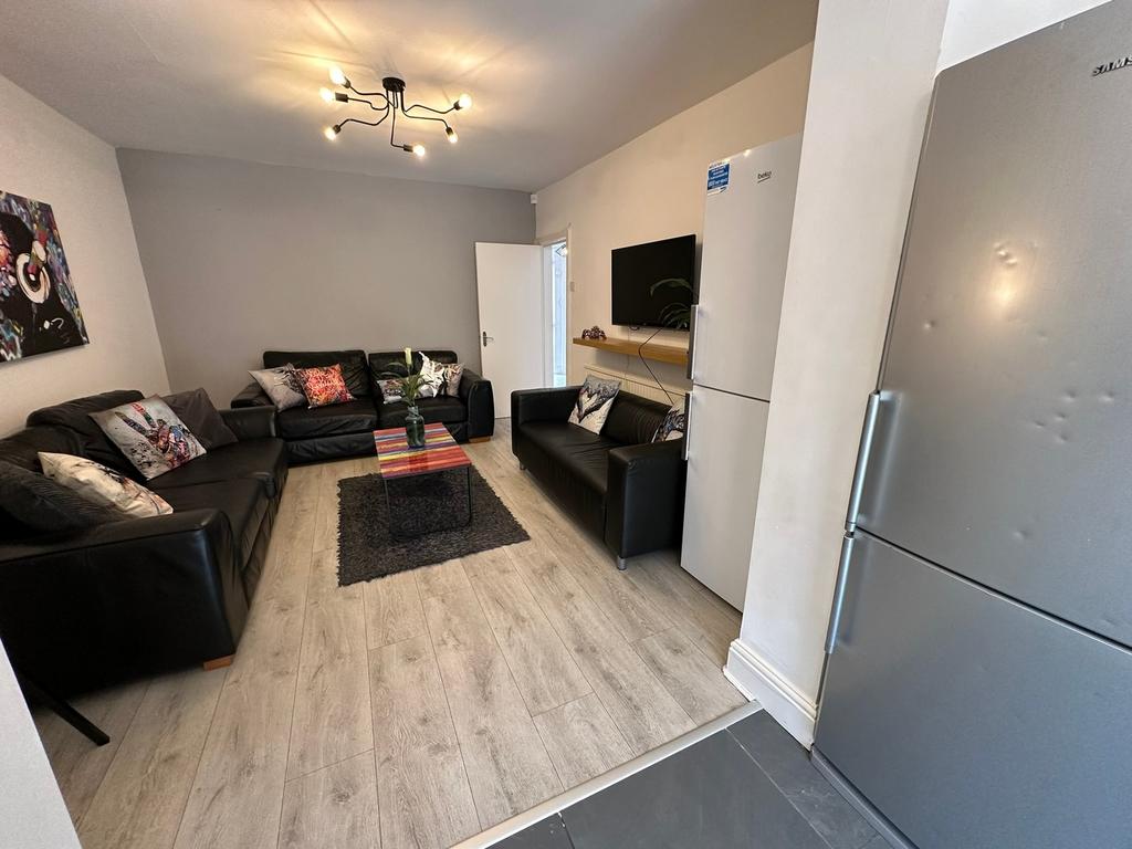 Spacious and inviting living room perfect for r...