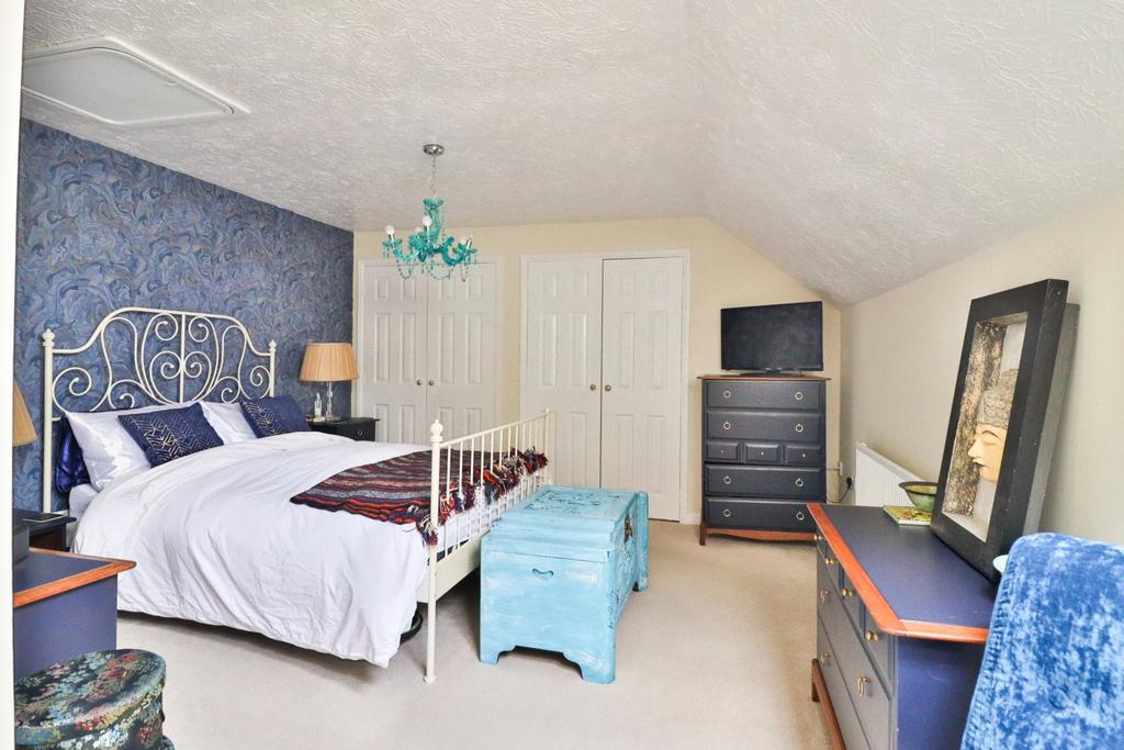 Main bedroom with fitted wardrobes