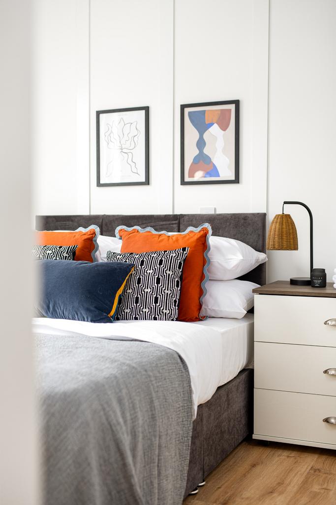 A beautifully designed double bedroom featuring...