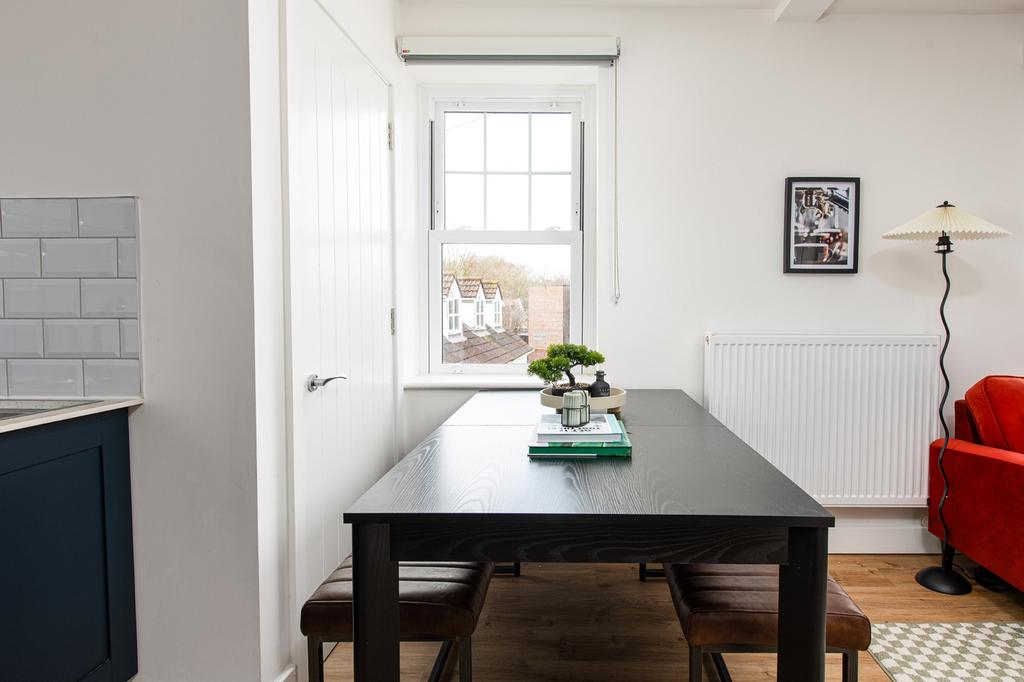 Bright and inviting kitchen area featuring a mo...
