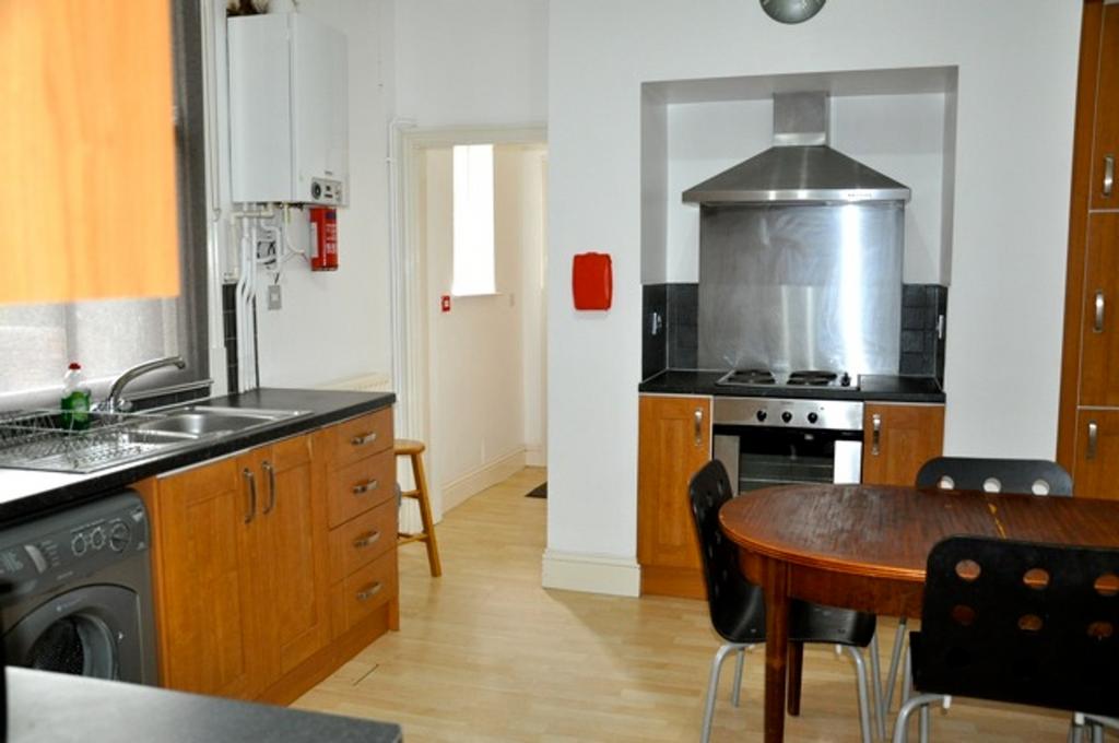 A bright and functional kitchen with modern app...