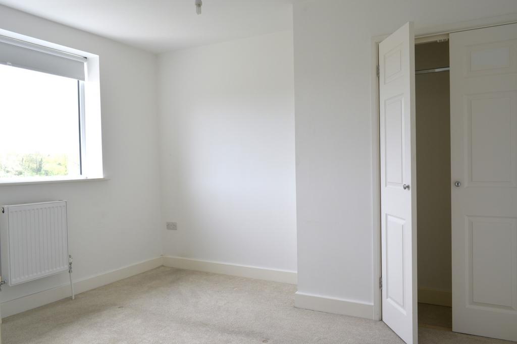 Bright and airy double bedroom featuring a larg...