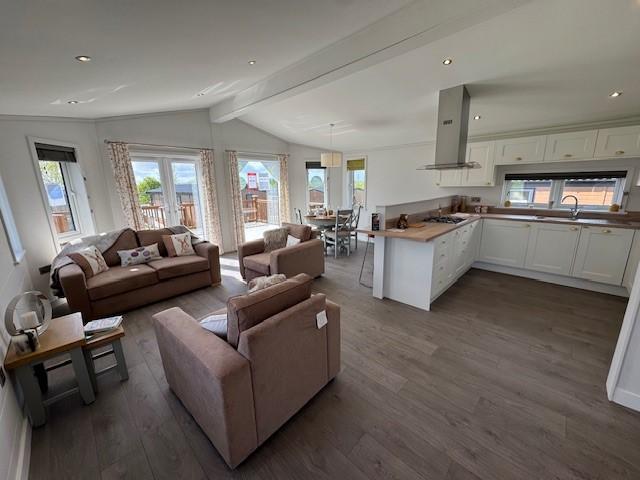 Combined living, dining and kitchen area