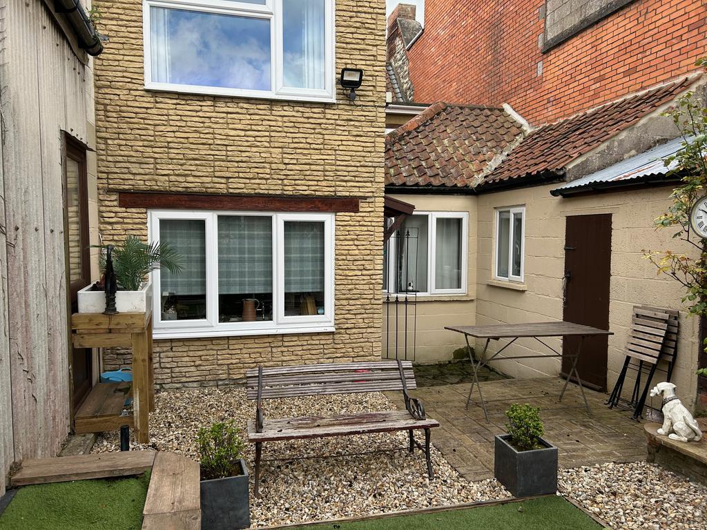 Patio area and log shed