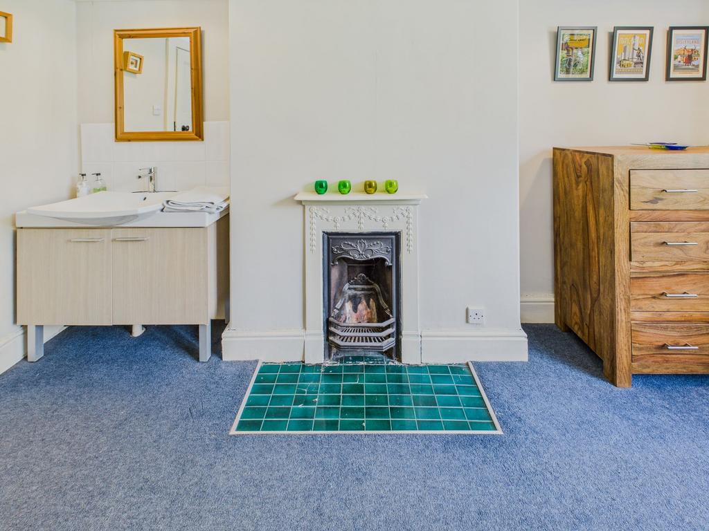 Bedroom Two Fireplace and Vanity Station