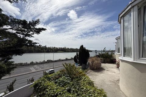undefined, Crabtree Villas, Plymouth. A simply stunning position with wonderful estuary views and three garages!