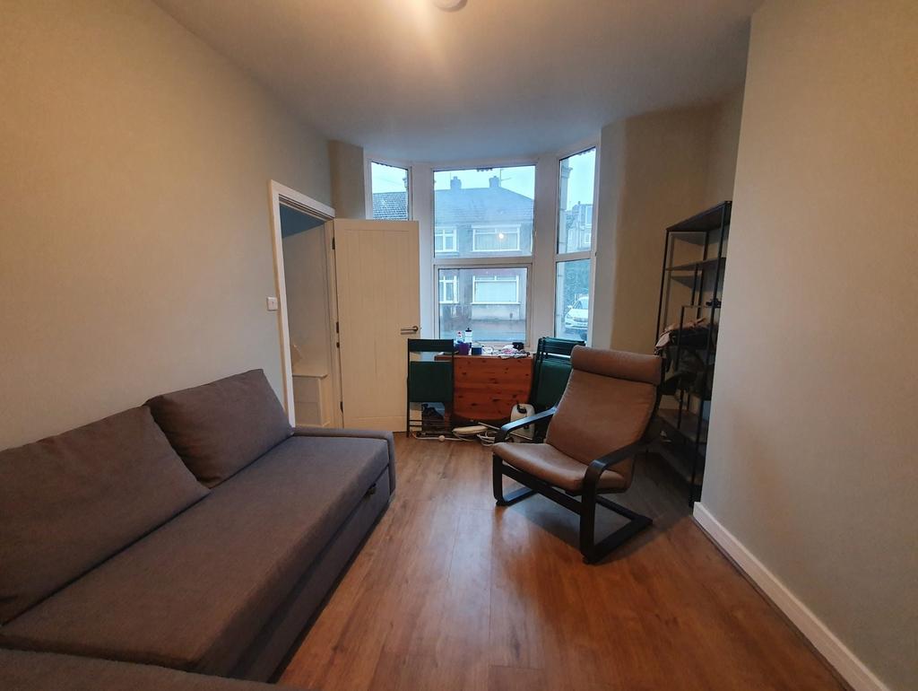 Bright and inviting living room featuring a com...