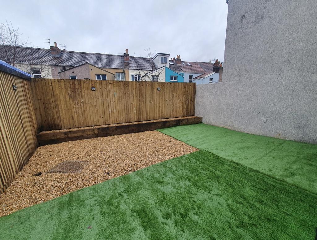 A charming garden area featuring a well-maintai...