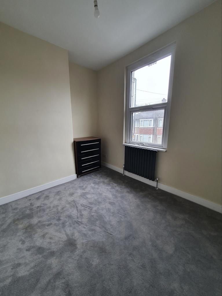Bright and inviting double bedroom featuring a ...