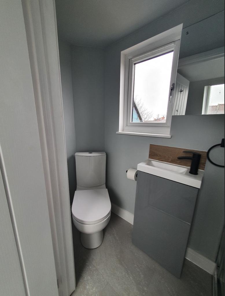 A modern single toilet with sleek design elemen...