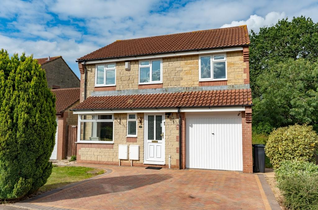 A charming and well-maintained exterior view of...