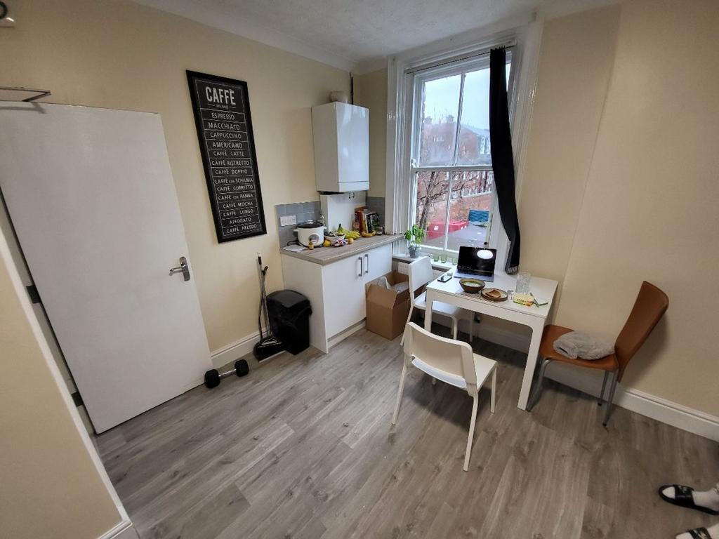 Bright and functional kitchen space, featuring ...