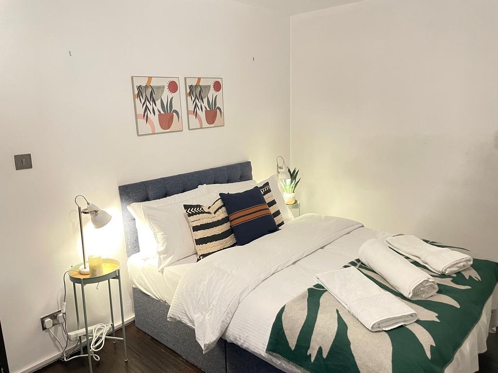A stylish and inviting double bedroom featuring...