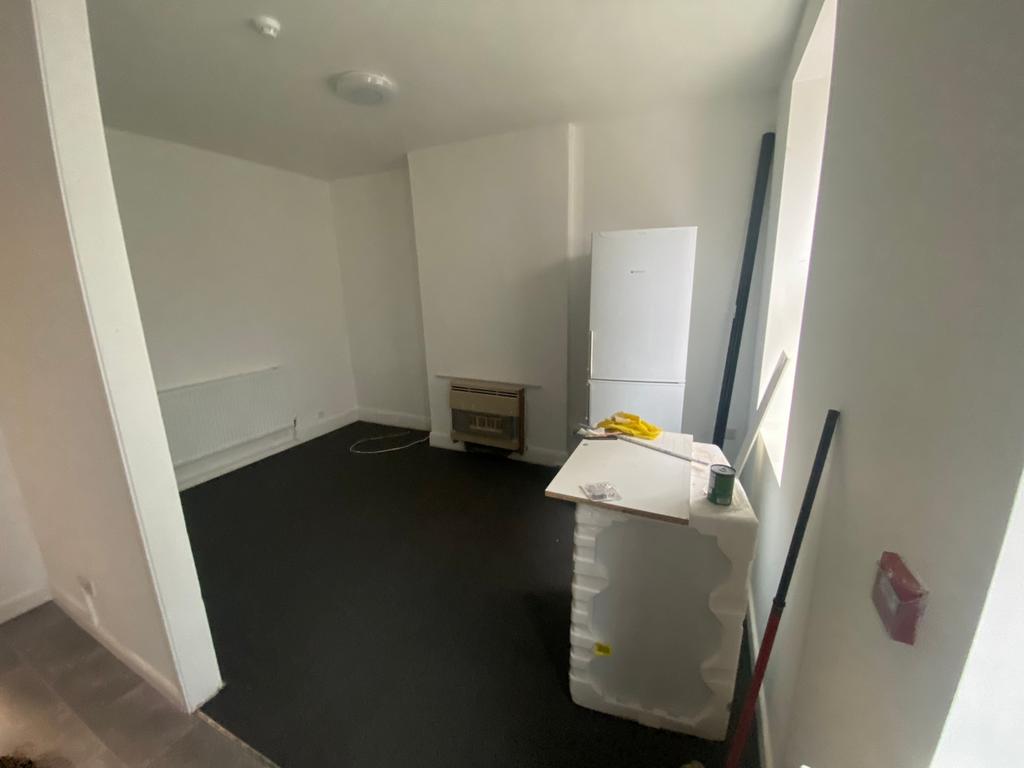 A spacious living room with good potential for ...