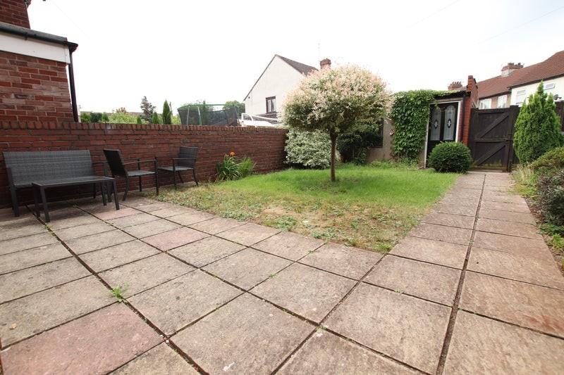 A beautiful garden space featuring a well-maint...