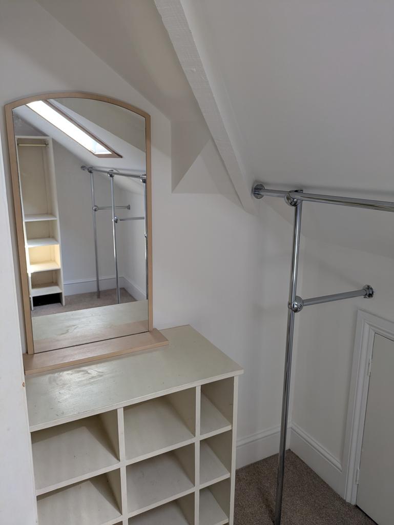 This versatile storage space features a well-ma...