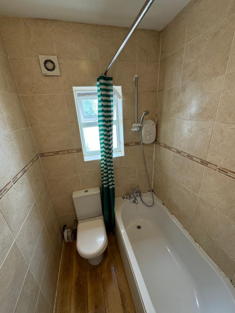 This inviting bathroom features a modern design...