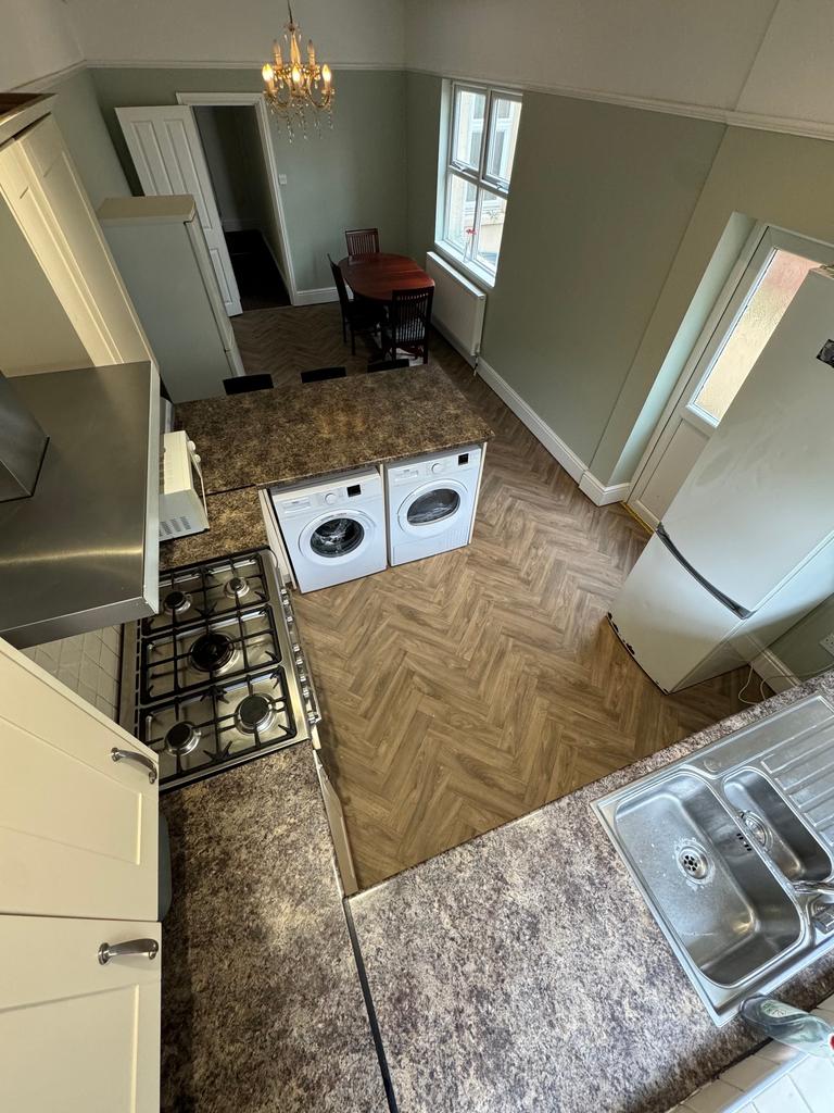 This charming kitchen features modern appliance...
