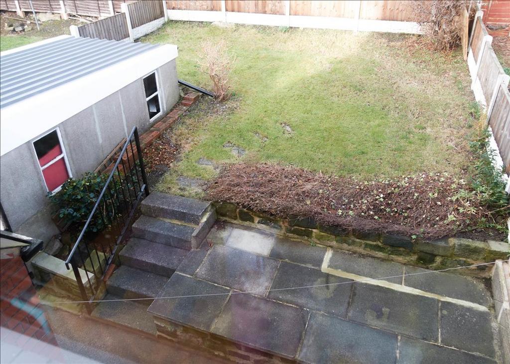A charming garden area featuring a well-maintai...