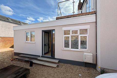 Retail property (high street) to rent - Milton Keynes MK17