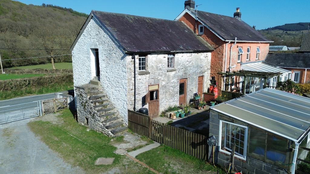 Attached stone and slate barn