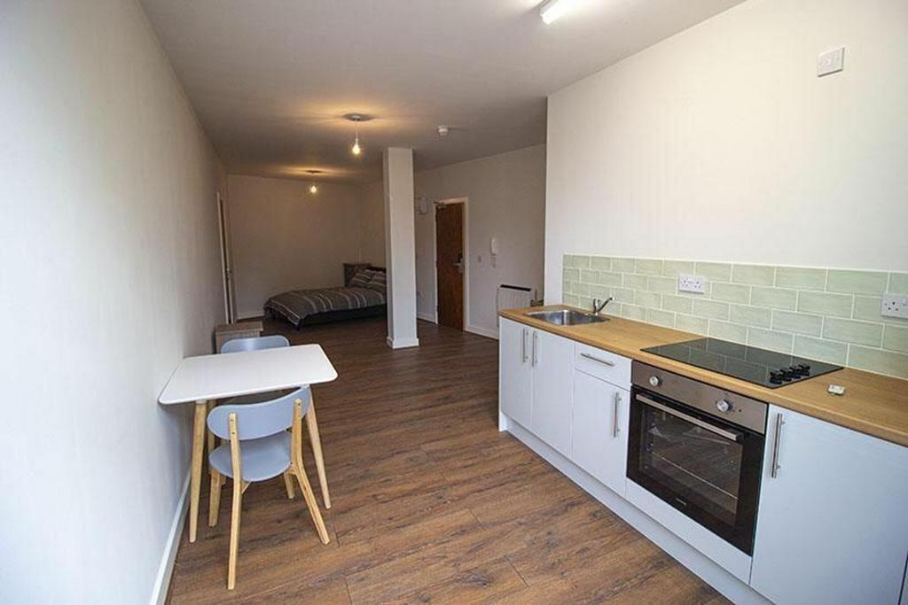 A stylish double bedroom featuring modern furni...