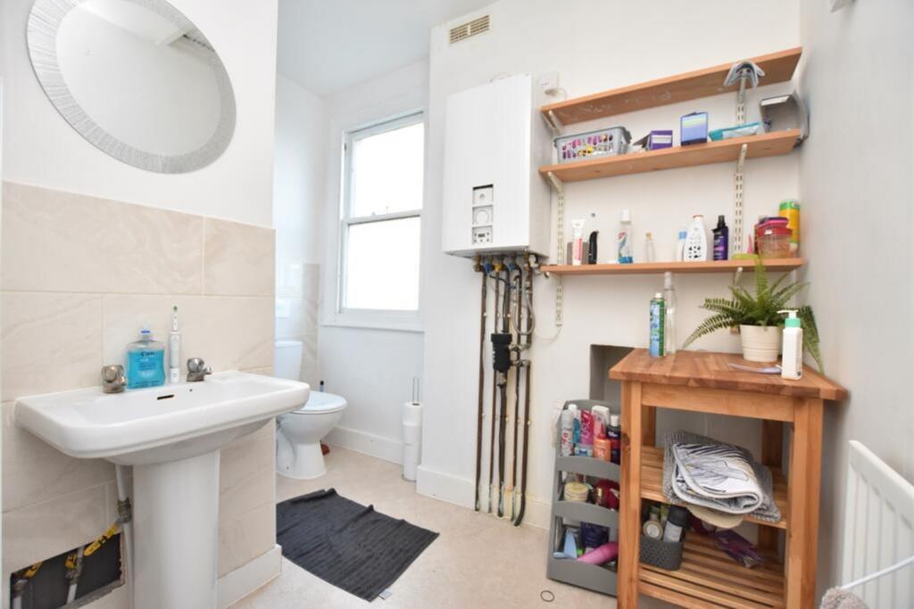 A well-maintained bathroom featuring modern ame...