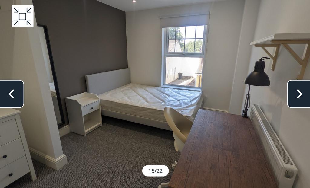 A bright and inviting double bedroom featuring ...