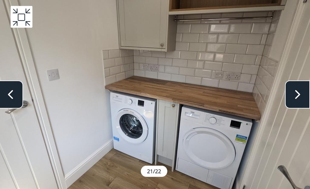 A clean and modern kitchenette with ample space...