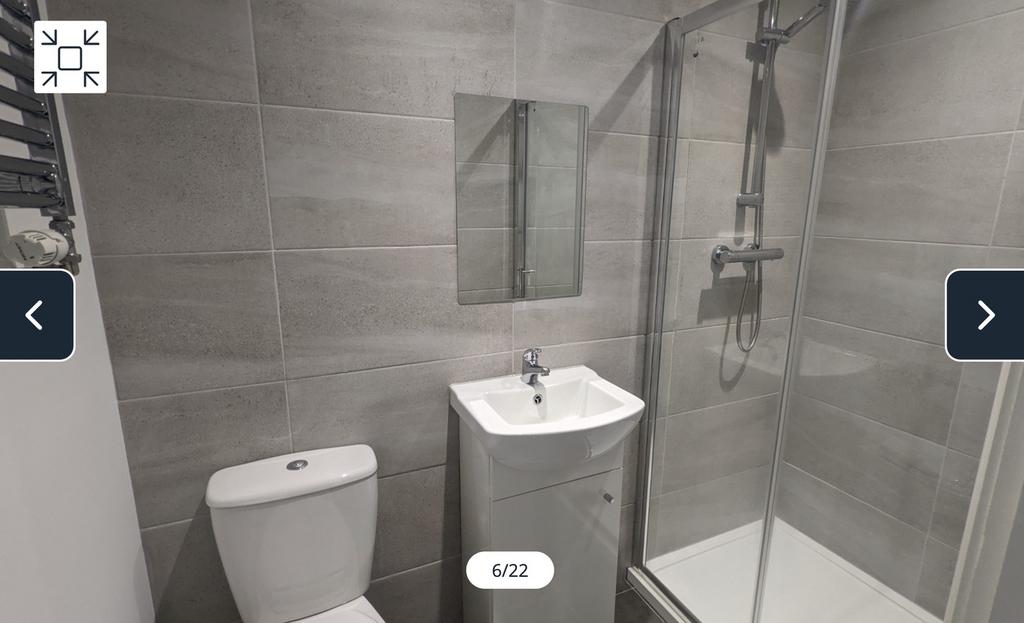 A modern and clean bathroom featuring a stylish...