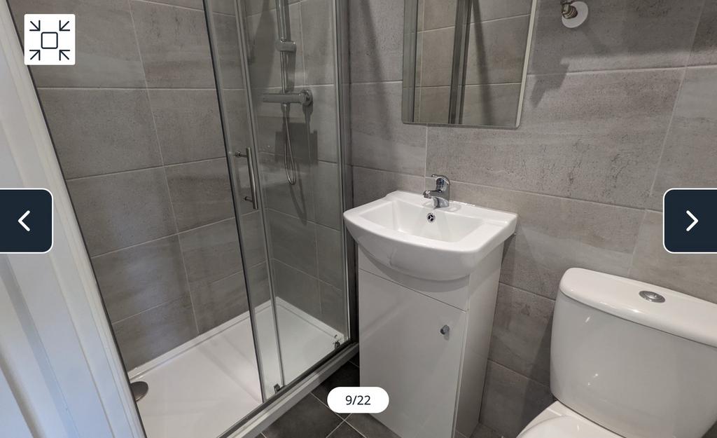 A modern and clean bathroom featuring a stylish...