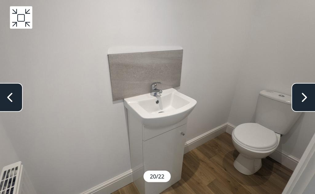 A clean and modern single toilet, featuring a s...