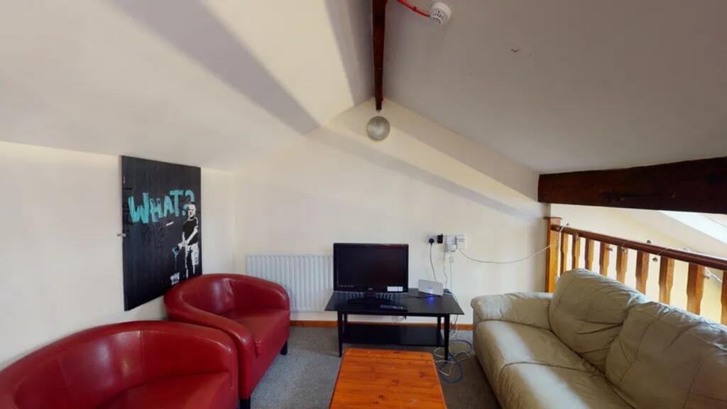 A cozy living room featuring comfortable seatin...